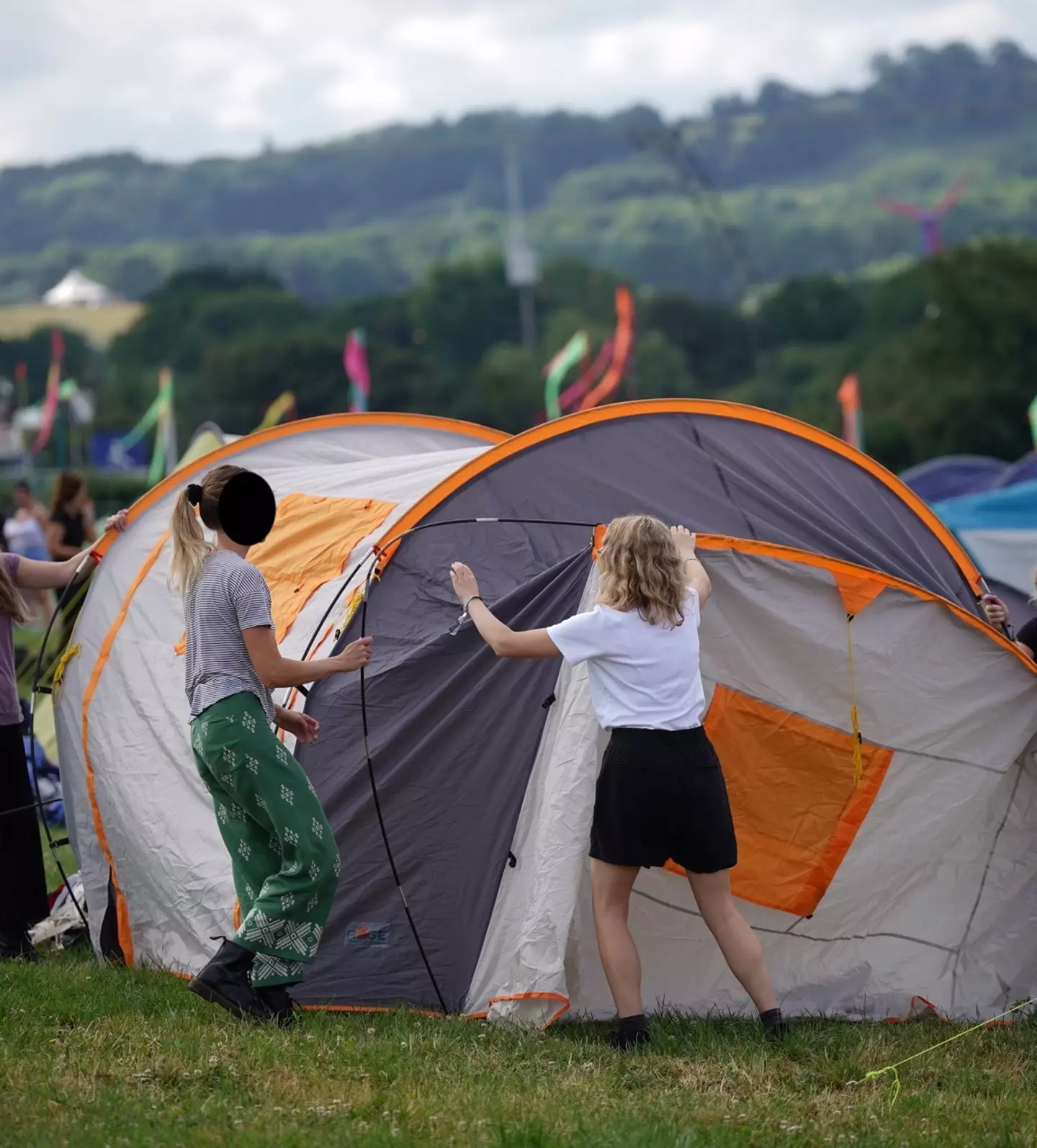 A Glastonbury local has hit out at festival-goers for pooing in their garden.