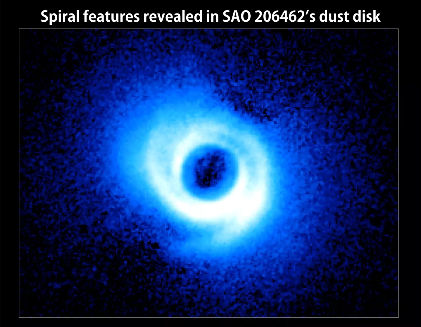 Two spiral arms emerge from the gas-rich disk around SAO 206462, a young star in the constellation Lupus.