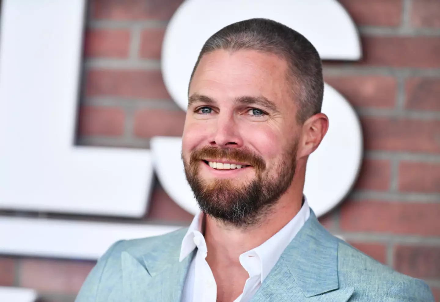 The 'Arrow' star is set to suit up as an LA lawyer in the Suits spinoff.