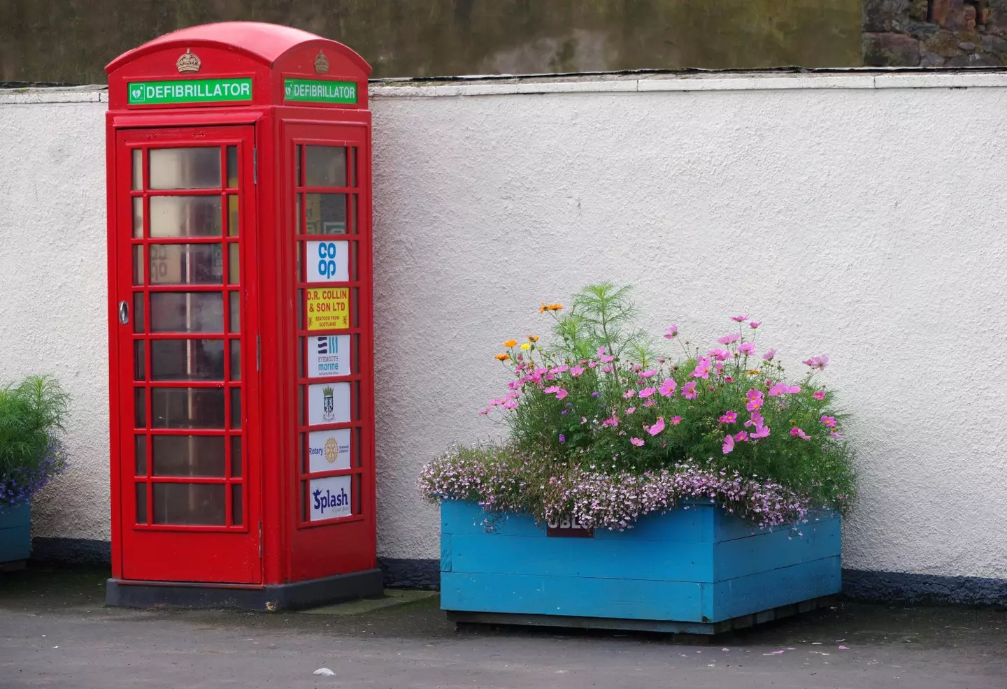 Some disused traditional red phone boxes are being used as defibrillator stations in the UK.