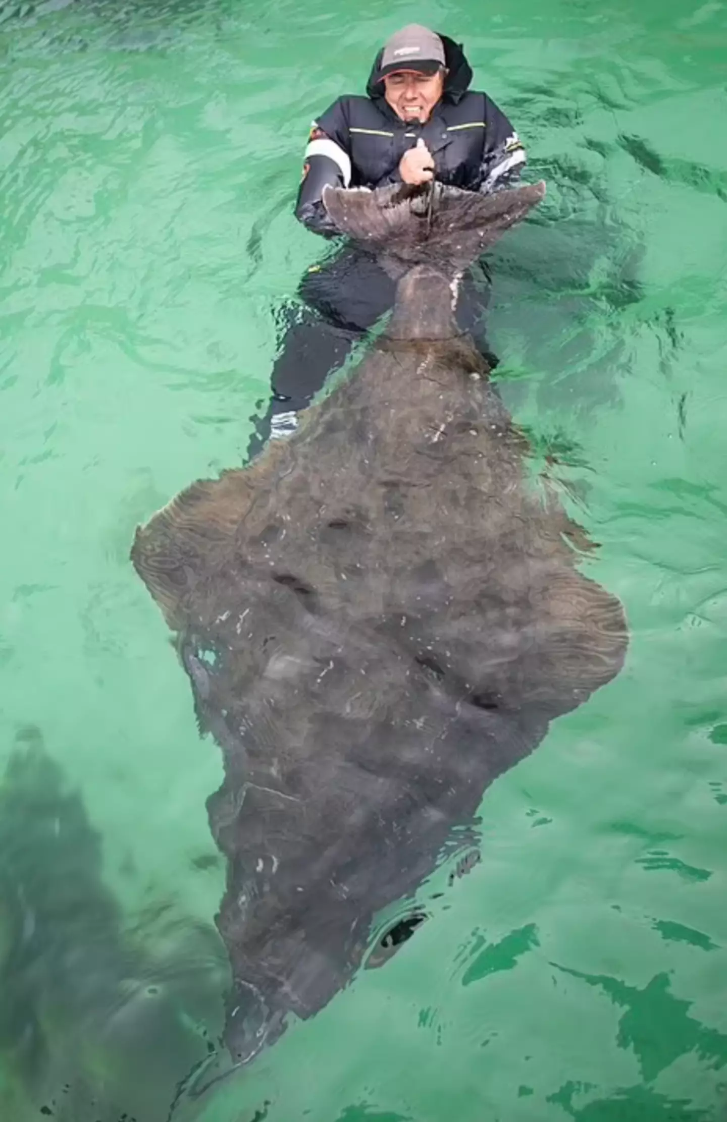 Stevens had to brave the chilly water to pose for a photo.