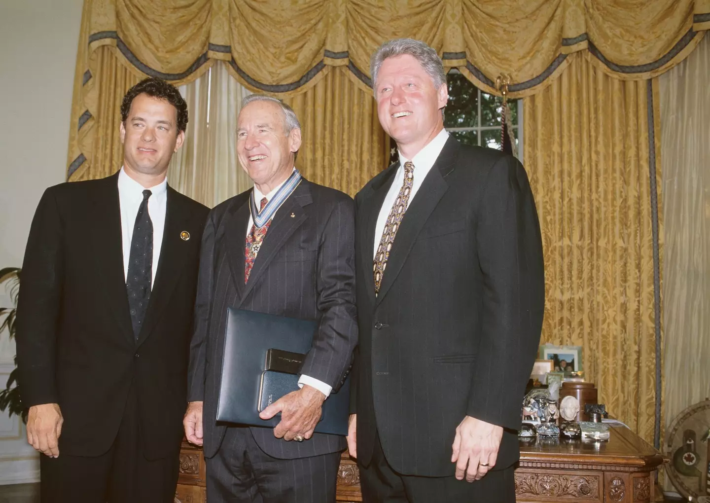 Hanks with Apollo 13 astronaut Jim Lovell and former president Bill Clinton.
