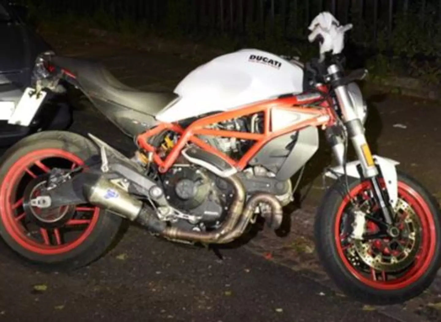 A police photo of the motorbike used in the shooting with the number plate DP21 OXY. (PA/Handout)