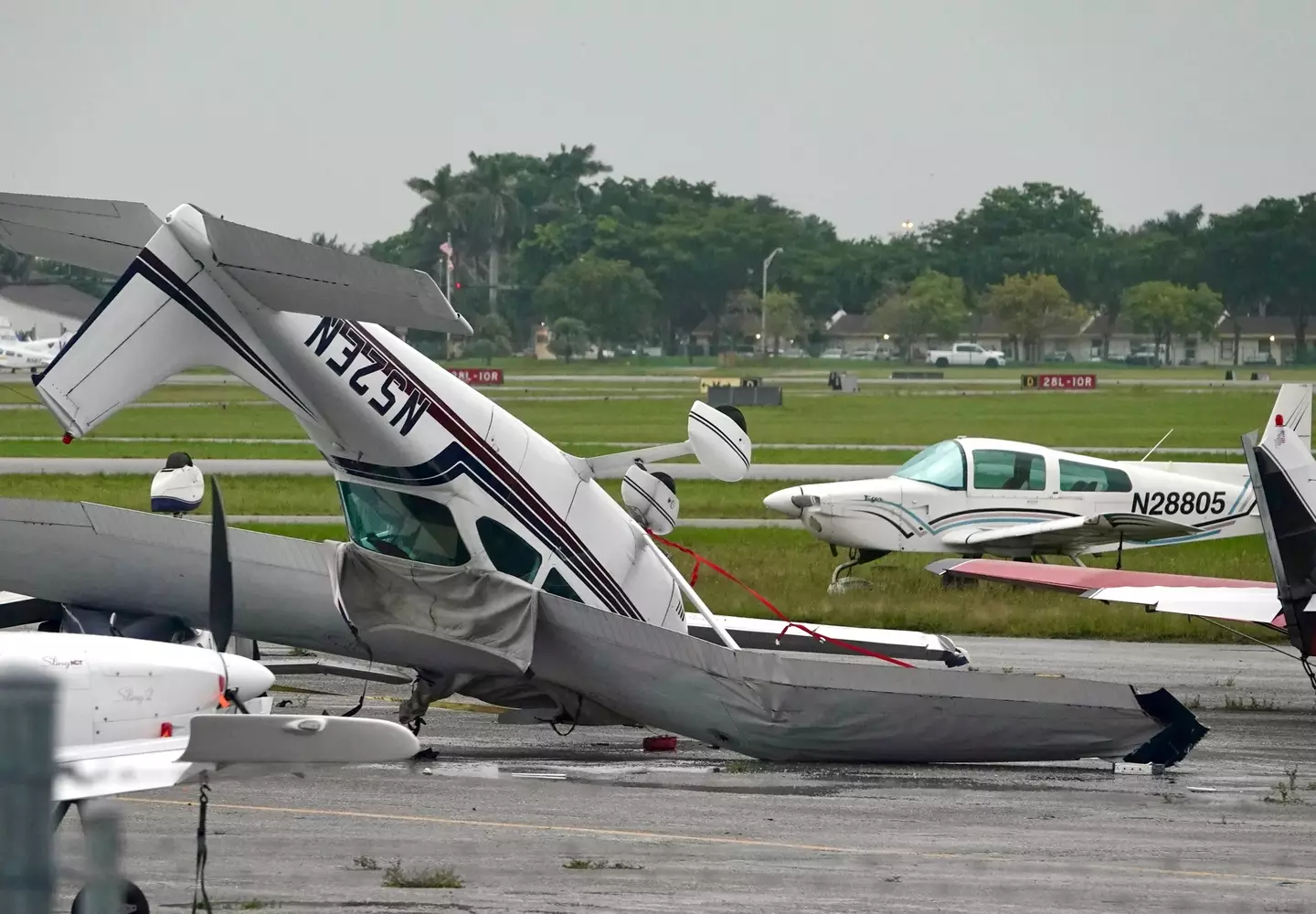 A plane that flipped over in the aftermath of Hurricane Ian.