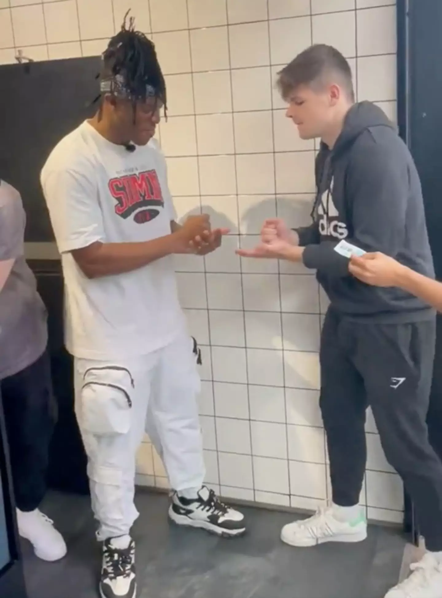 Jordan beat KSI in a game of rock, paper, scissors.