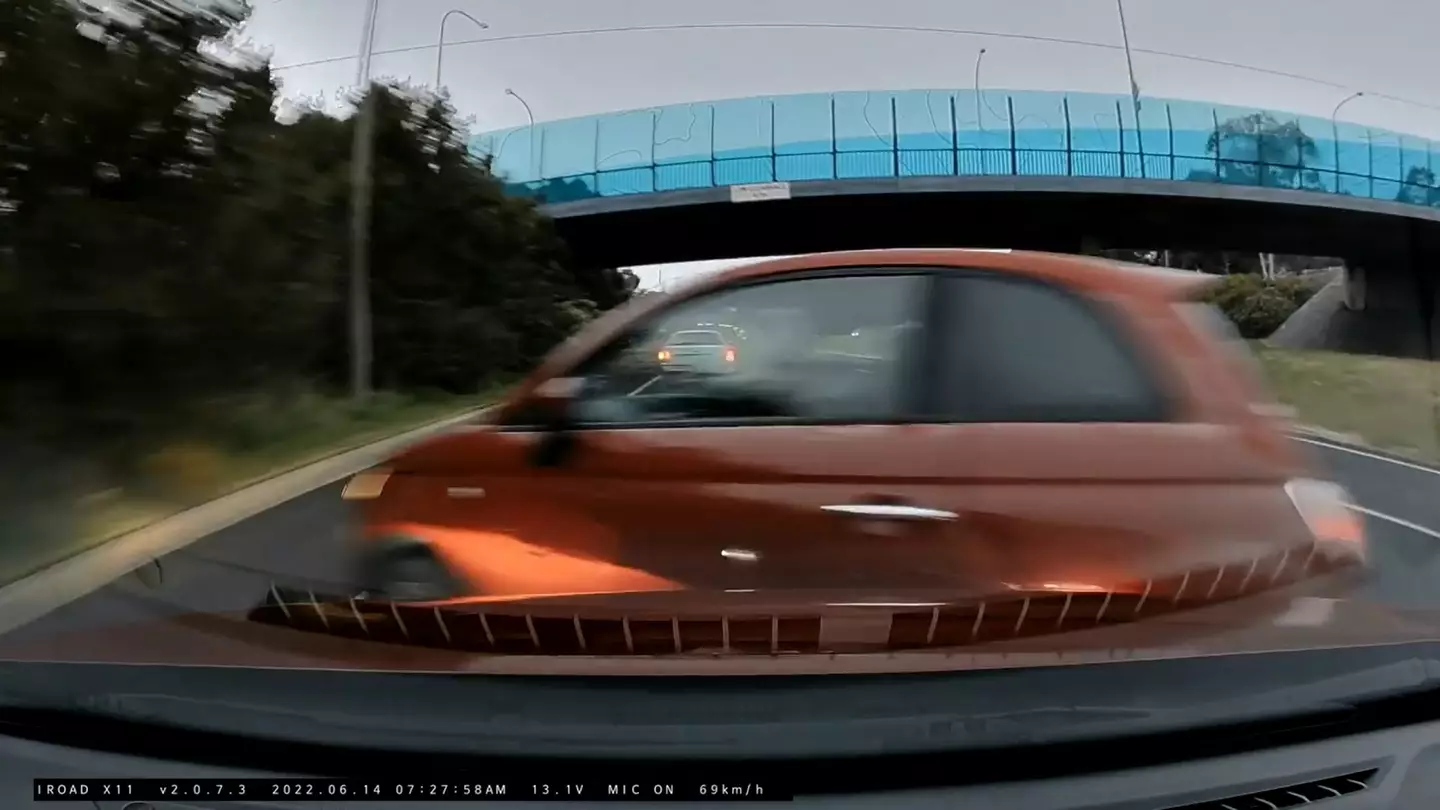 The Fiat is sent spinning off the motorway after the crash.