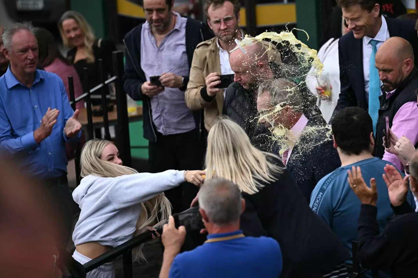 The politician was well and truly milkshaked. (BEN STANSALL/AFP via Getty Images)