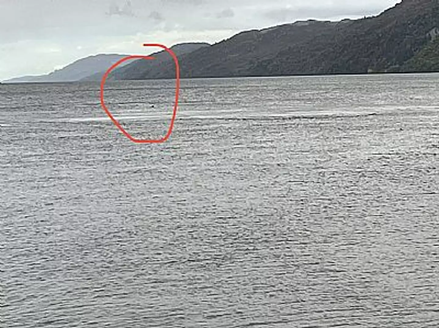 A further mysterious black lump spotted at the Loch Ness in the Scottish Highlands has been recorded.