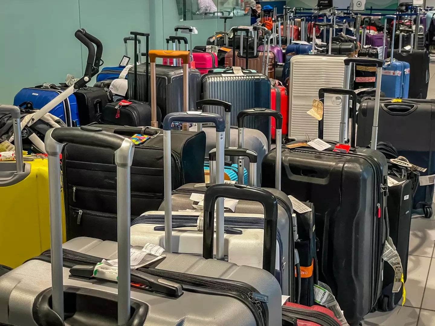 Your luggage is instantly more distinguishable if it's vibrant or has tags (Getty Stock Images)