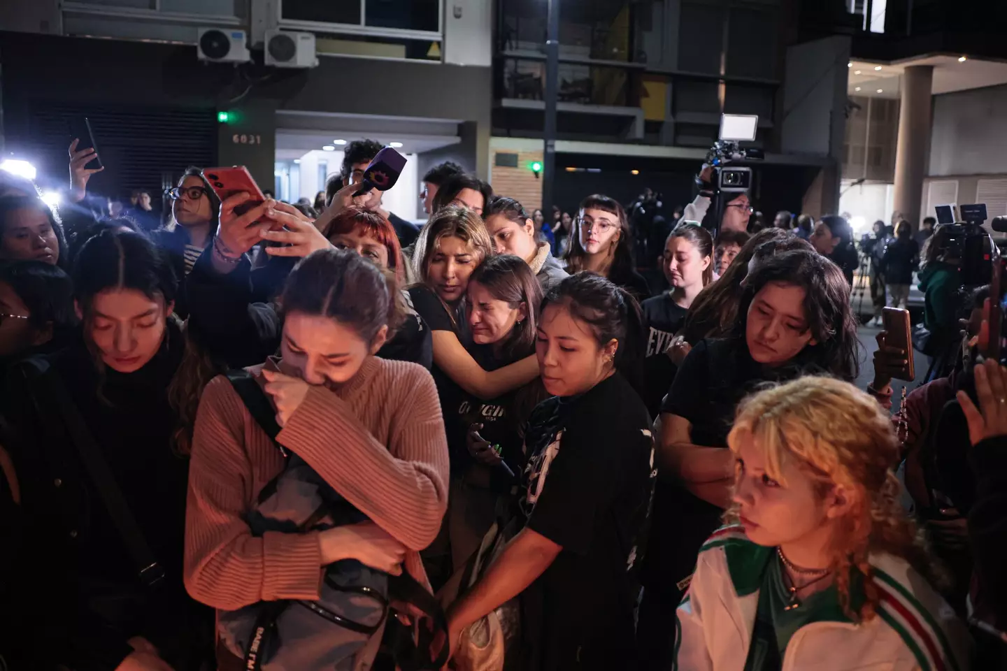 Fans gathered outside the hotel in Argentina to pay tribute to Liam Payne (Luciano Gonzalez/Anadolu via Getty Images)