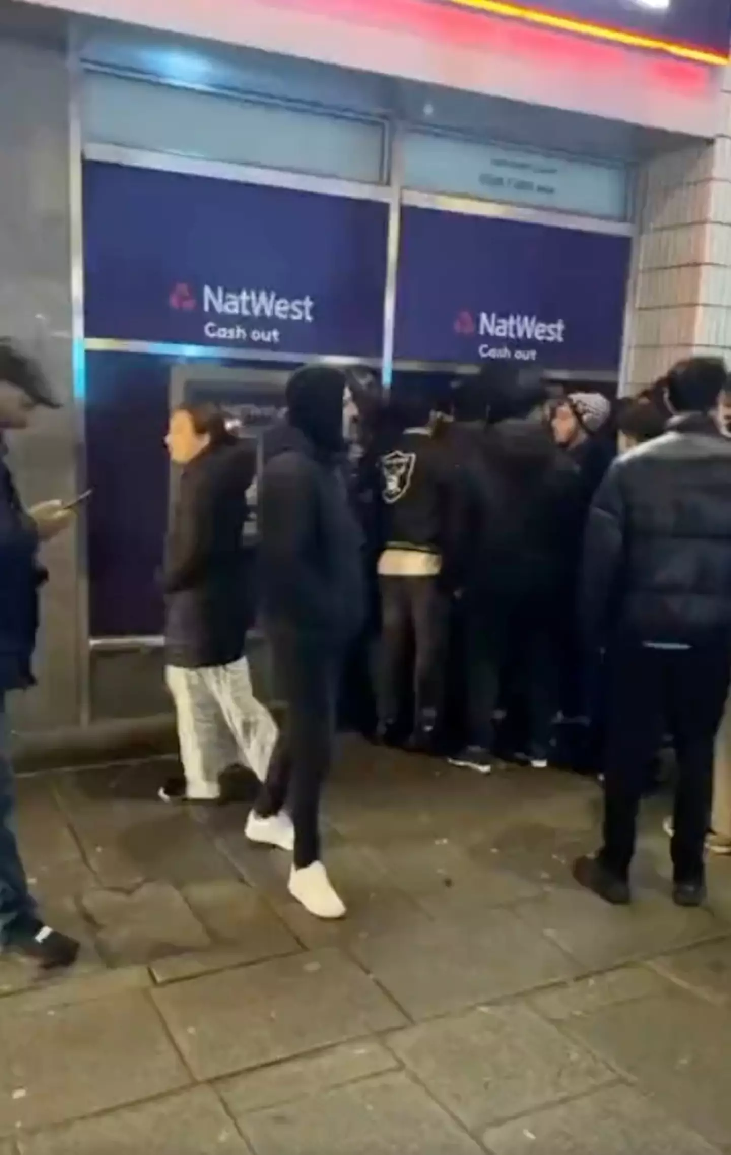 People rushed to the rogue ATM to try and bag some free cash.
