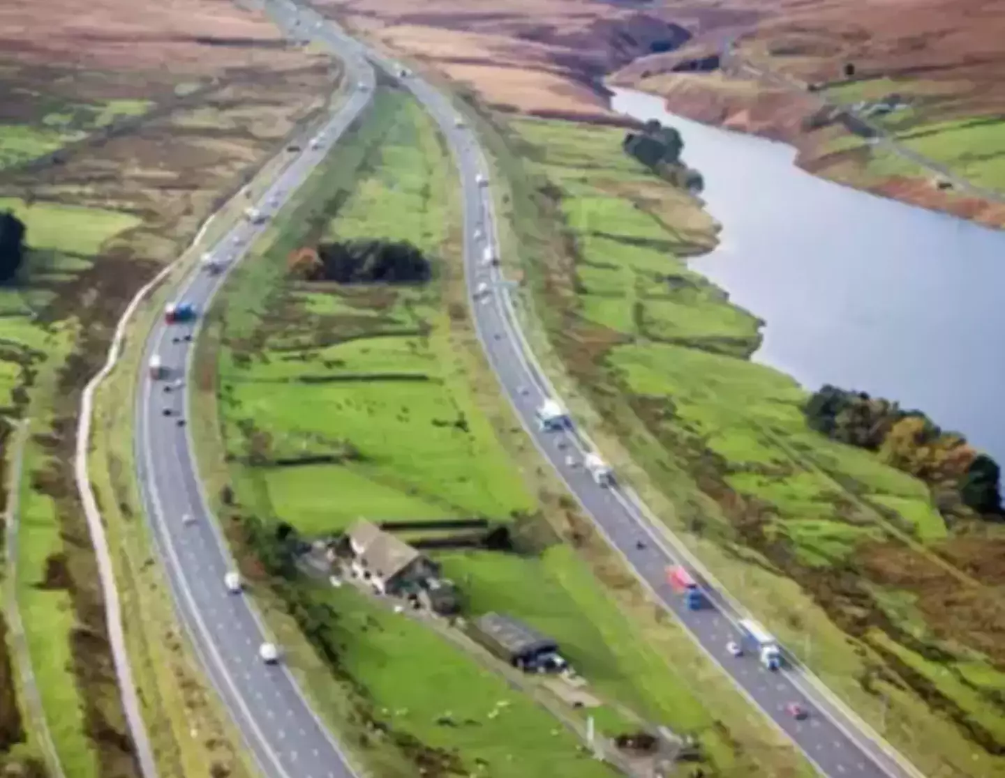 It's plonked in the middle of the M62, or rather the M62 was plonked either side of the house (BBC)