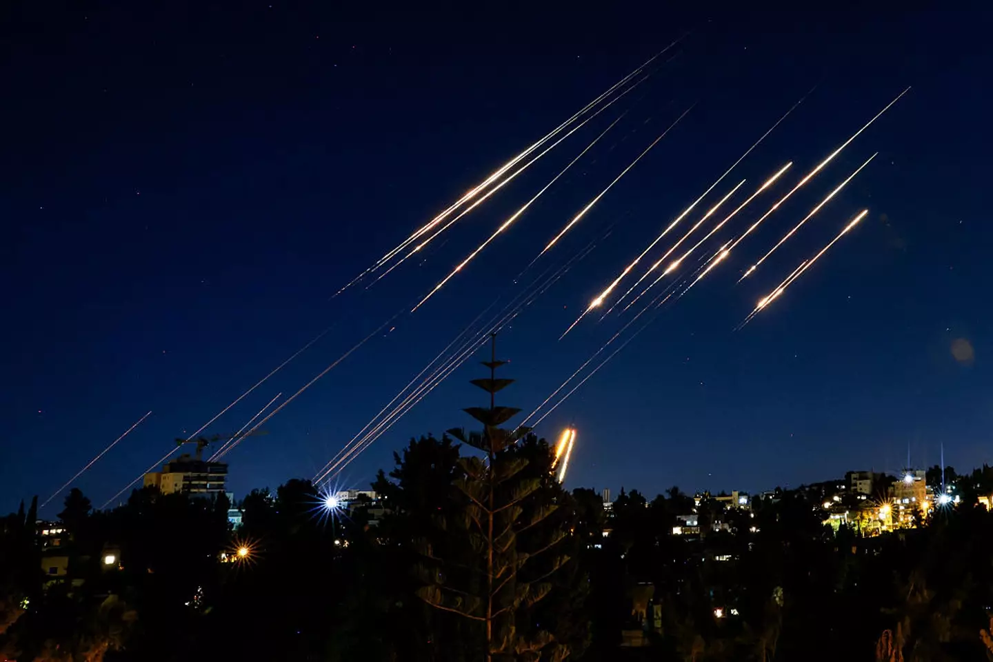 Iran's response to Israel's attacks on their nuclear infrastructure (MENAHEM KAHANA/AFP via Getty Images)