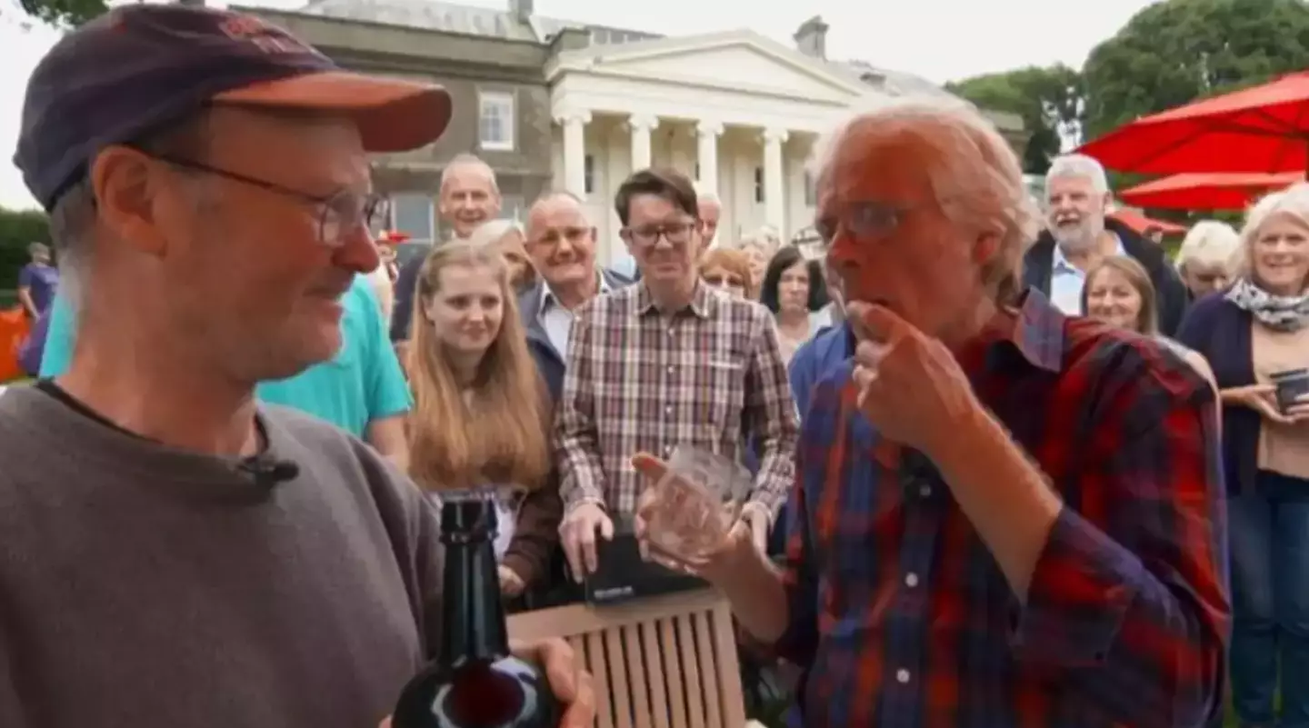 Andy McConnell drank from a 180-year-old port bottle in 2016. (BBC)