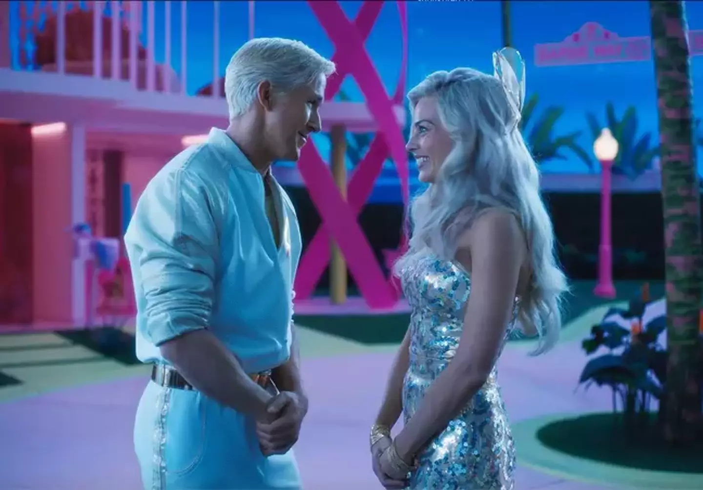 Margot Robbie as Barbie alongside her Ken.