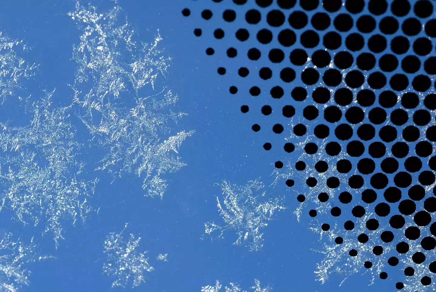 People are just discovering what the black dots on car windscreens are actually for 2 The majority of motorists have no idea what the dots are for (Getty Stock Image)