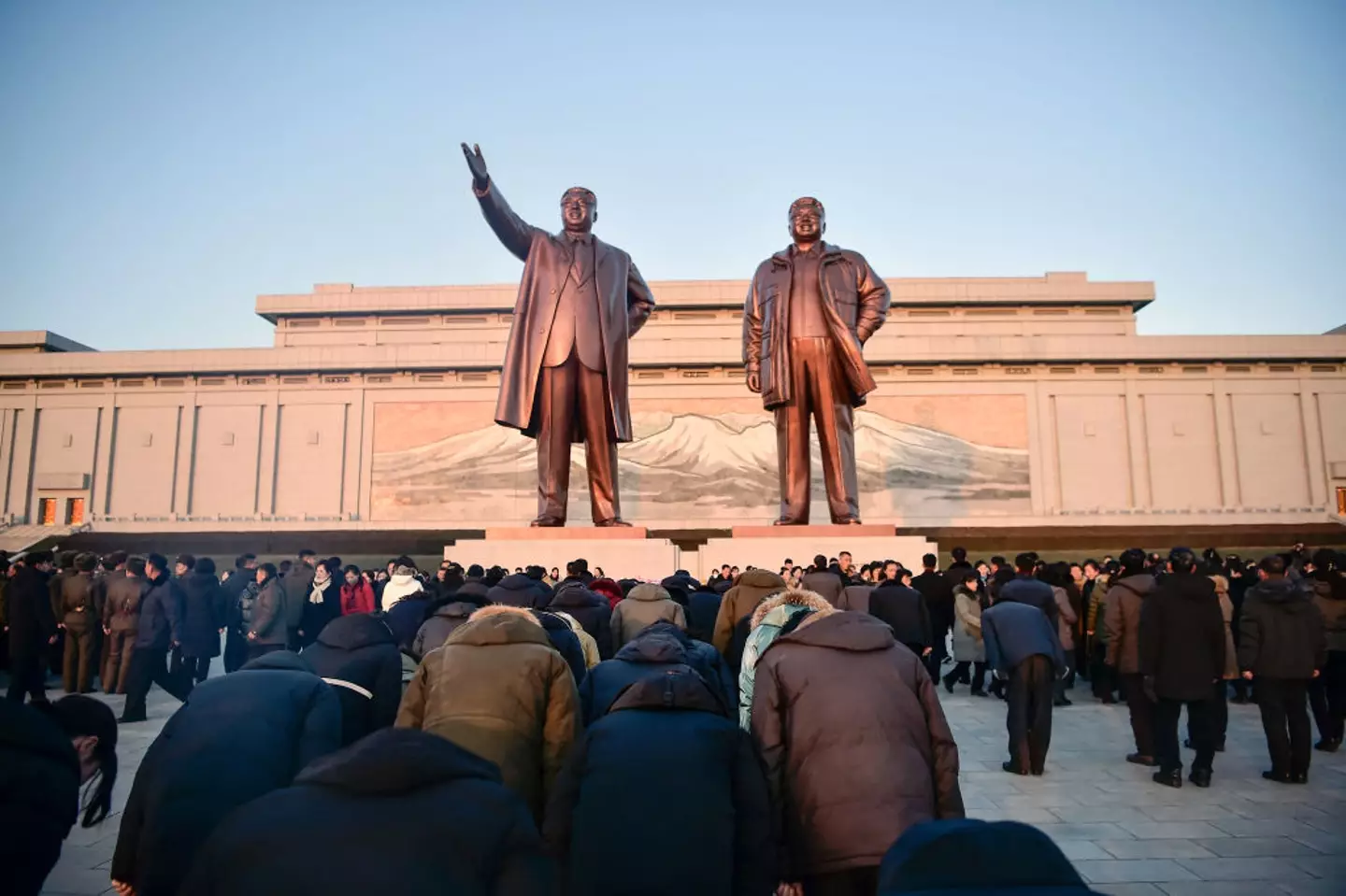 Statues of the previous dictators of North Korea must be bowed down at by all tourists (KIM WON JIN/AFP via Getty Images)
