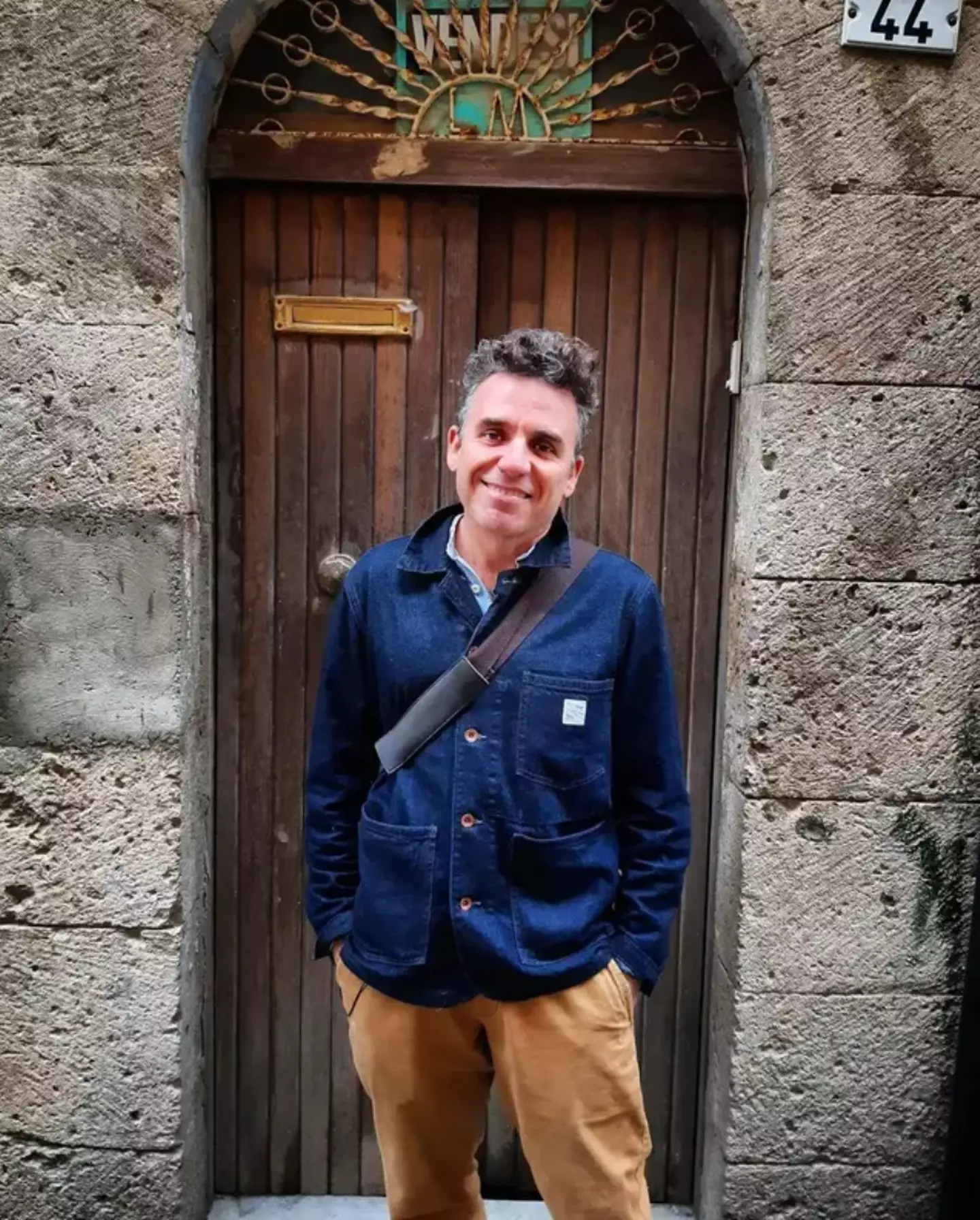 Danny McCubbin outside his old house in Mussomeli.