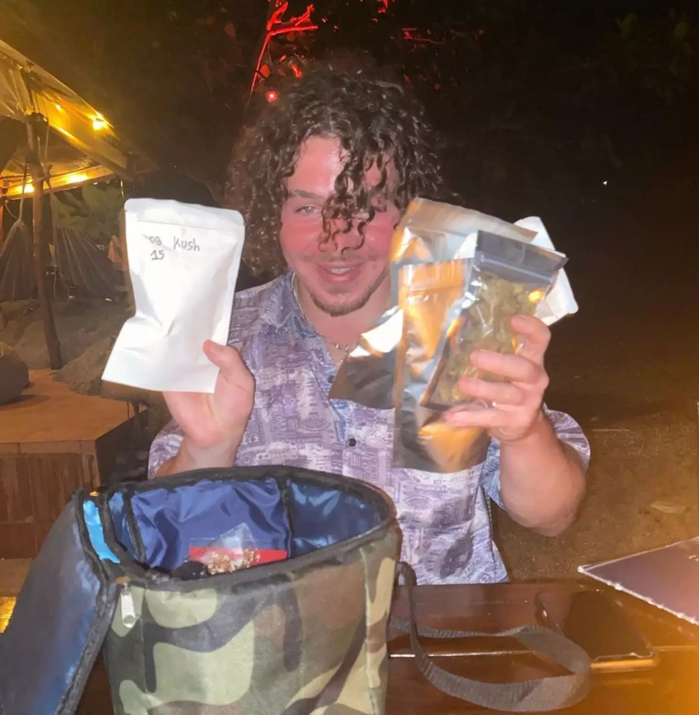 Daniel Roche was seen holding a bunch of a number of drug-like substances.