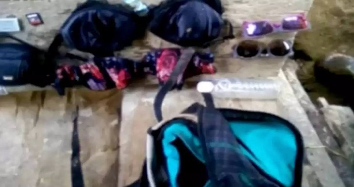 Some of the pictures show the women's belongings spread out on some rocks next to a plastic bag and wrappers.