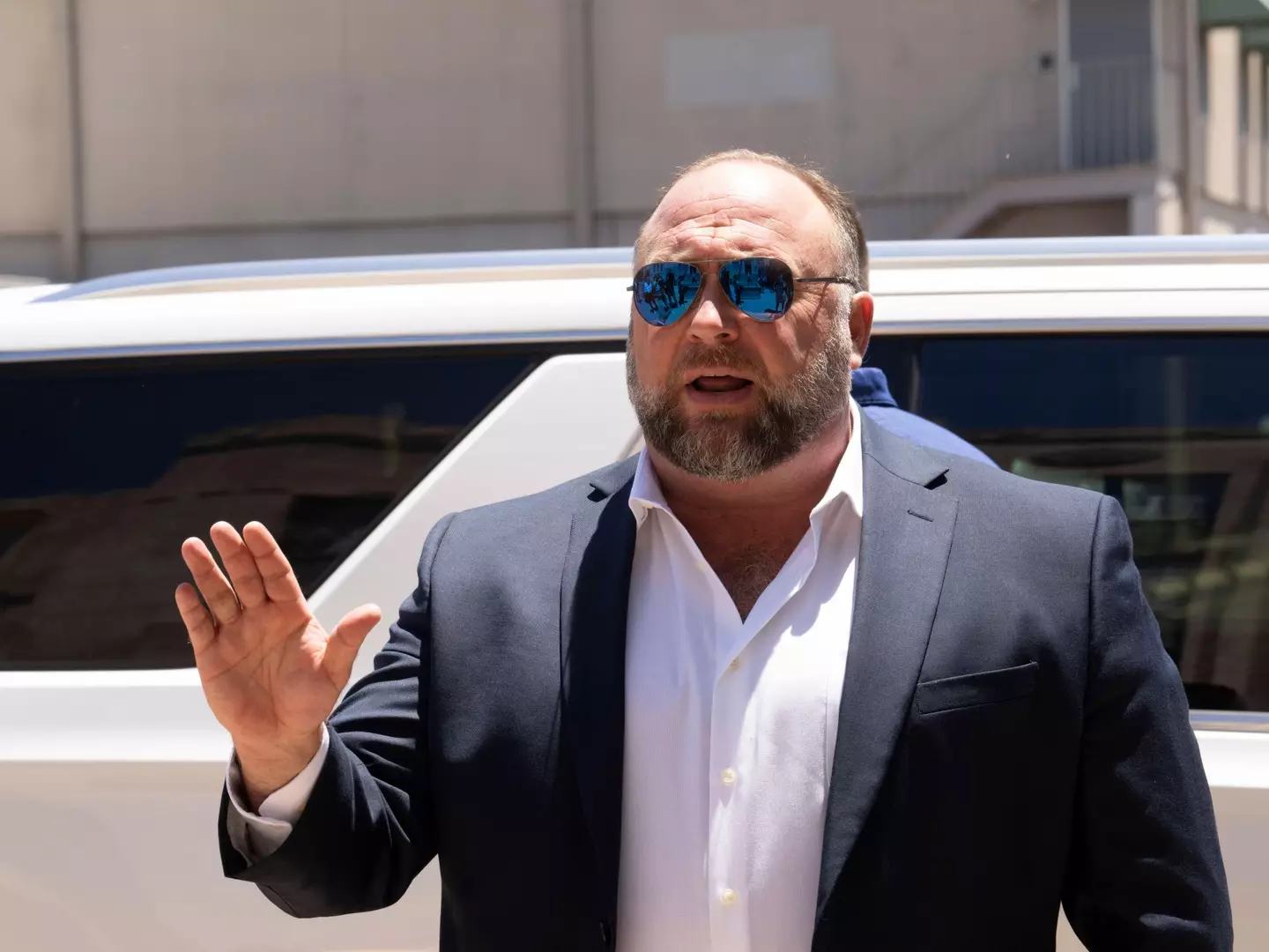 Alex Jones arrives at a Texas court in August.