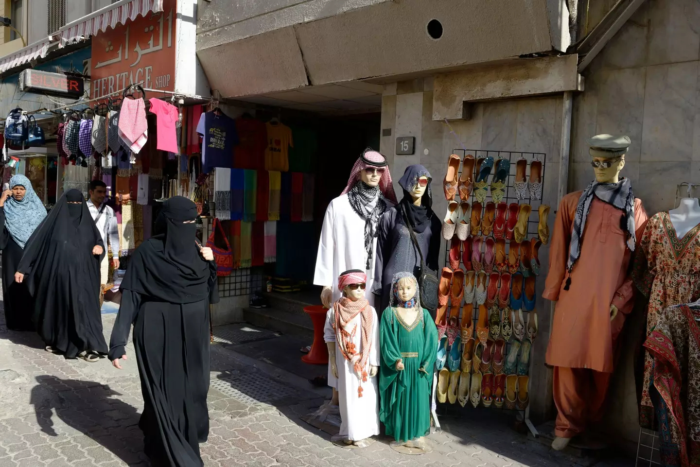While you don't necessarily have to wear a burqa or taqiyah, you must make sure to cover up as much as you can (Frédéric Soltan via Getty Images)