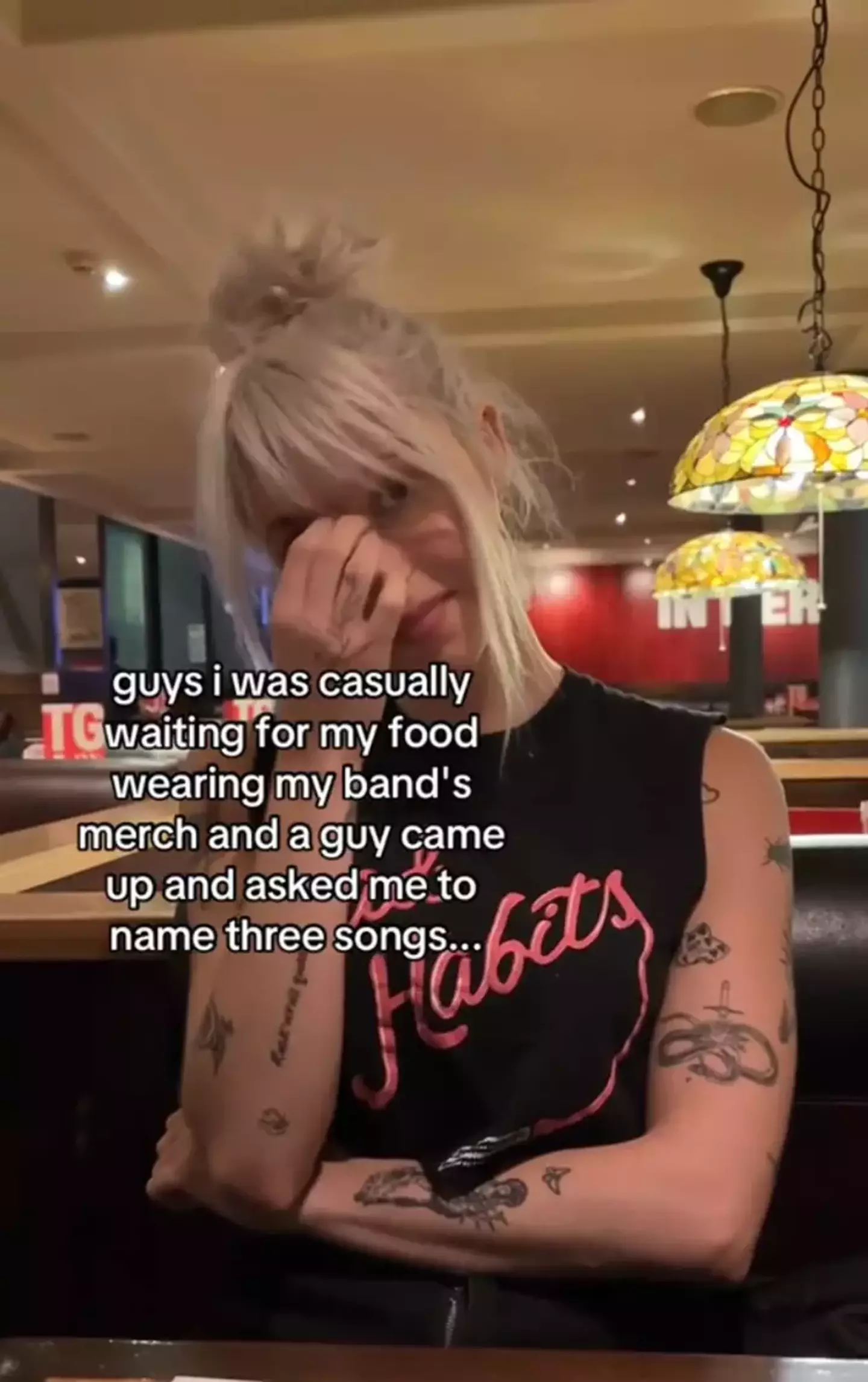 The trouble wearing your own band merch gets you in... (TikTok/@whatisrocknroll)