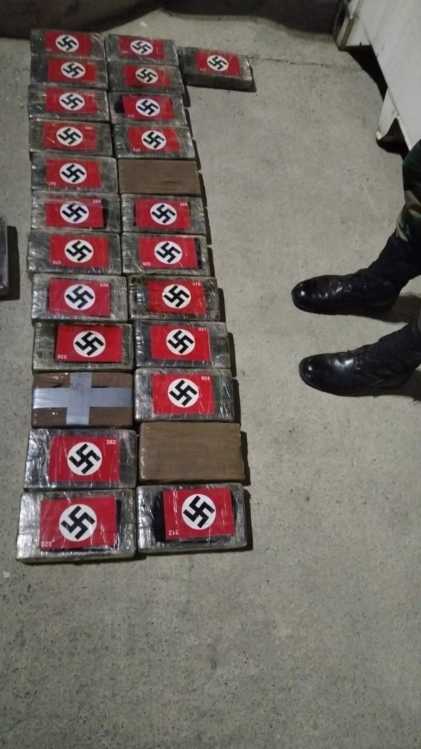 Each brick of cocaine was adorned with a red, white and black Nazi swastika flag.