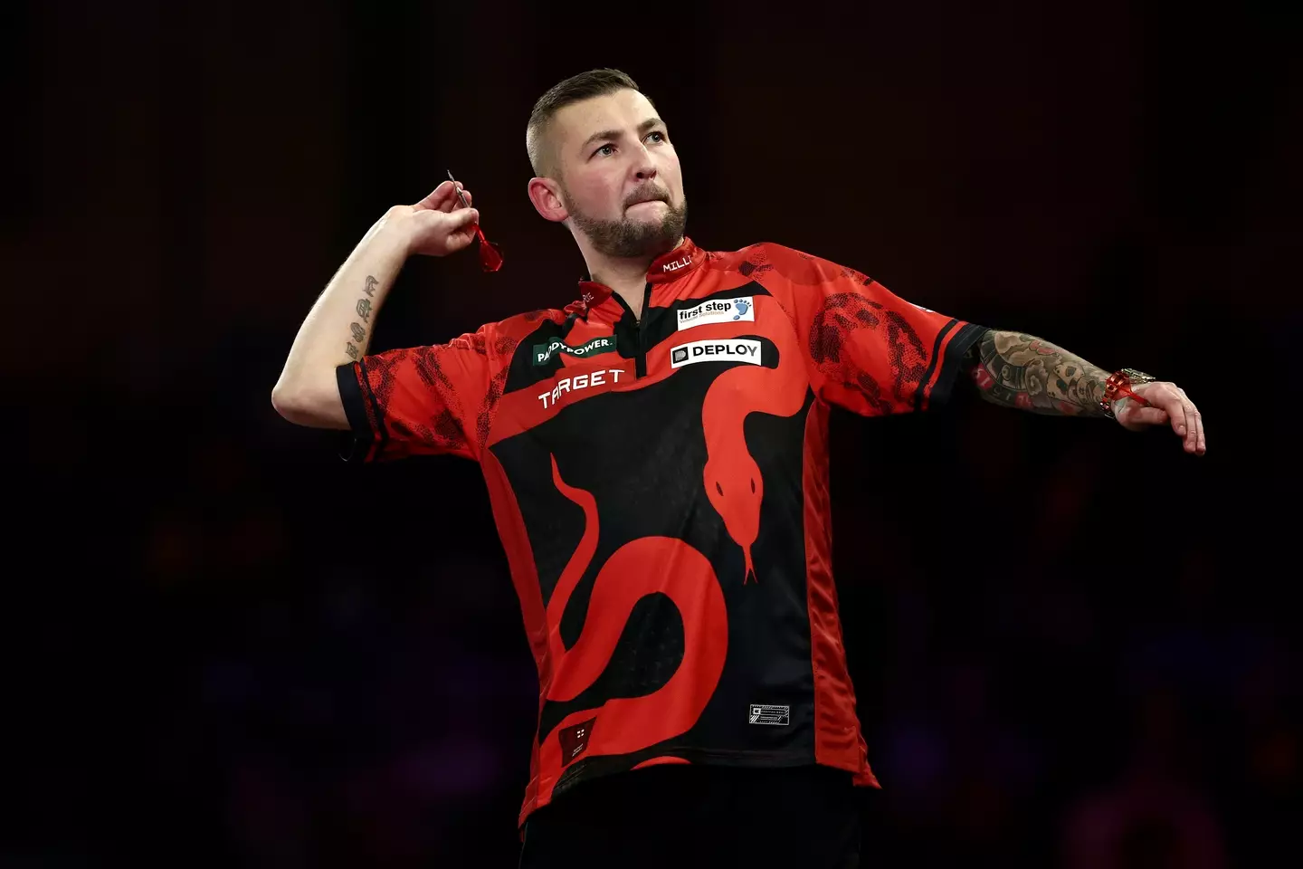 Nathan Aspinall said that Luke Littler was a 'nice kid' but some other darts players were jealous of him. (James Fearn/Getty Images)