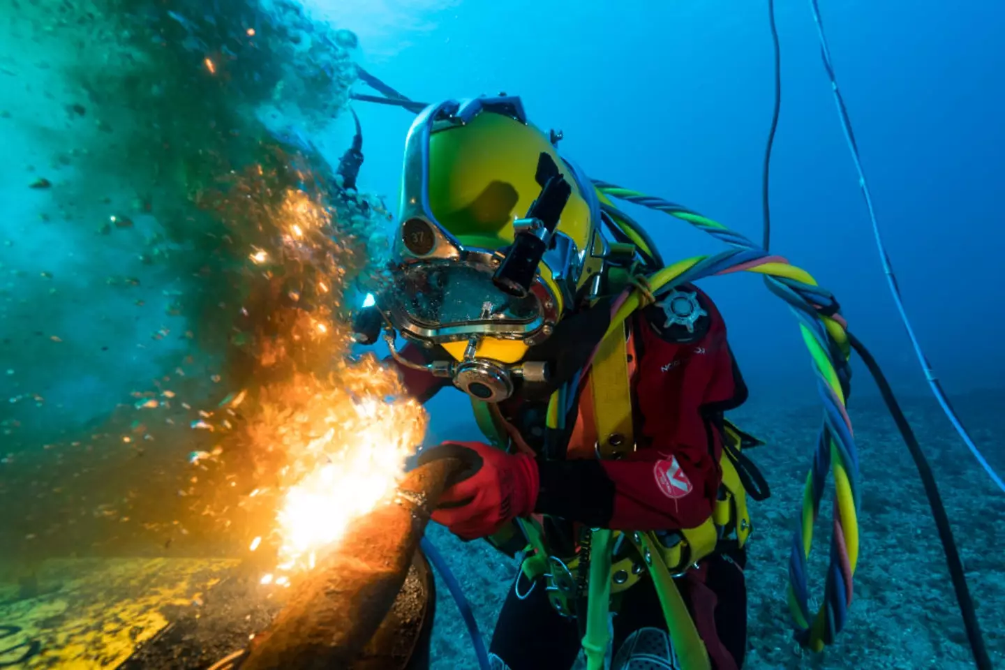 Working with heavy machinery underwater is incredibly risky.