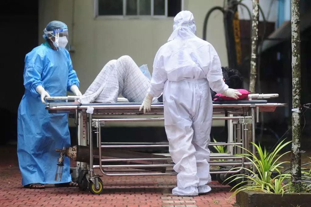 A nurse who caught the virus is said to still be in critical condition (/AFP via Getty Images)