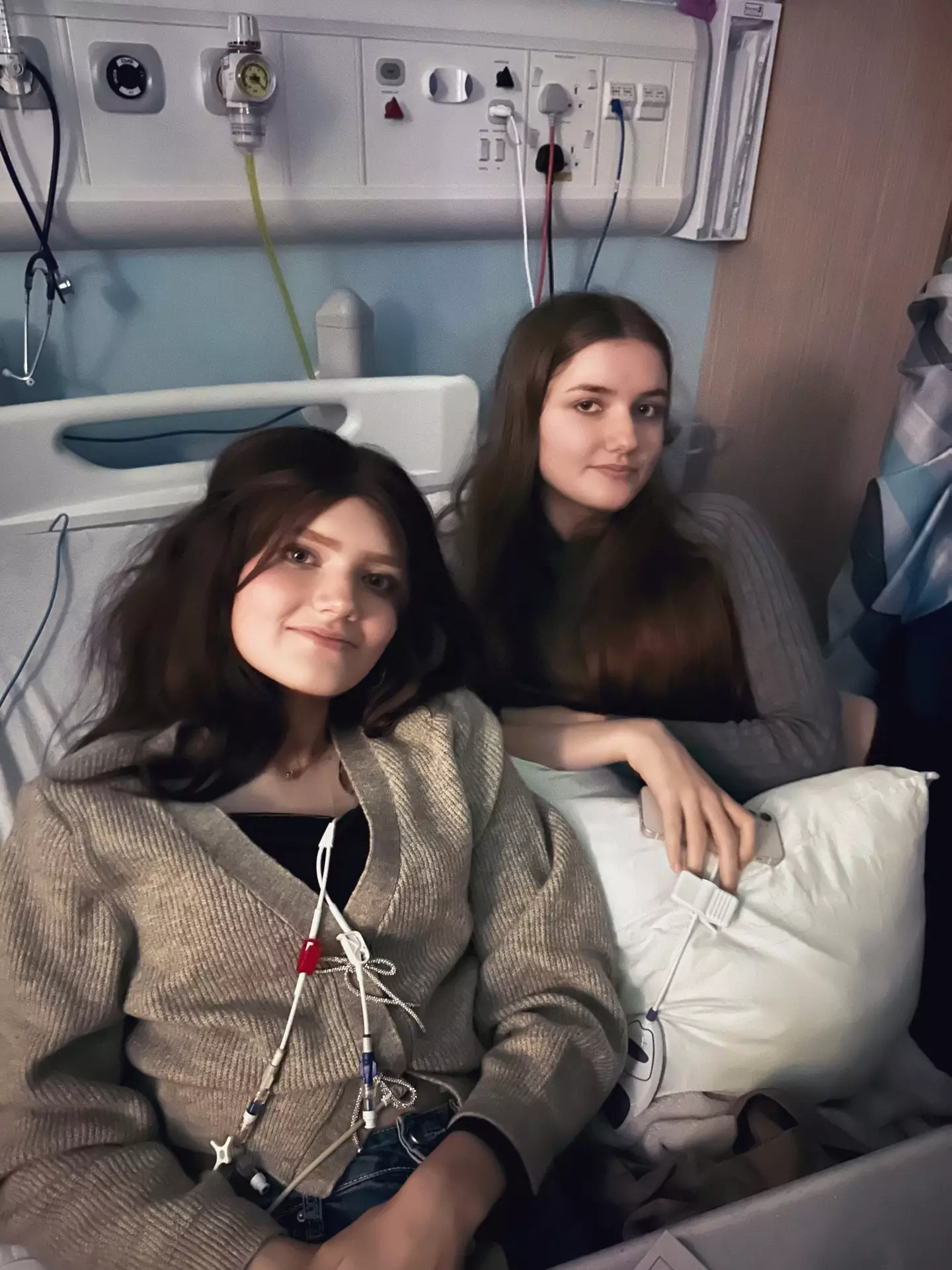 The teenage girl has 'bizarrely' suffered from the same cancer symptoms as her identical twin.