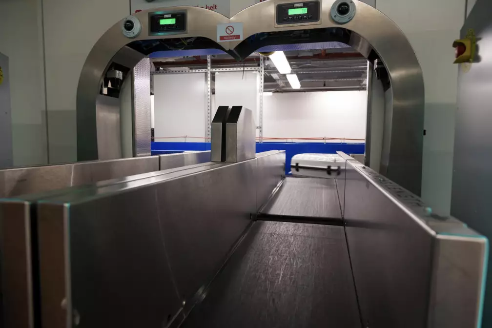 Bags typically belong on here, but one passenger was told to step on the airport scales.