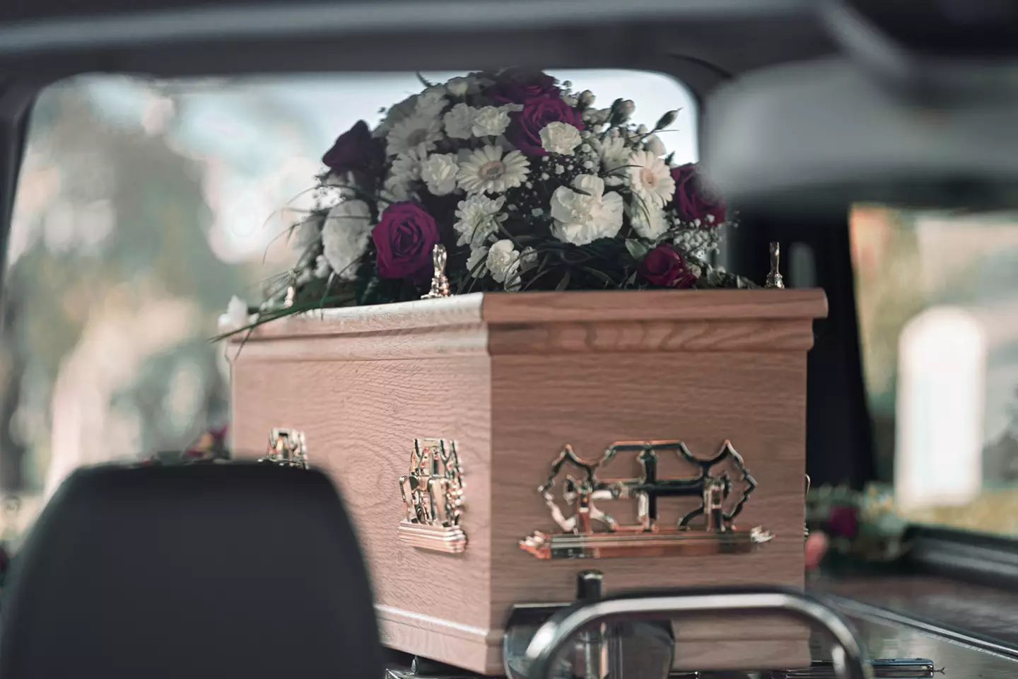 The funeral home company has apologised after a dead body fell from their hearse into the street (Getty Stock Images)