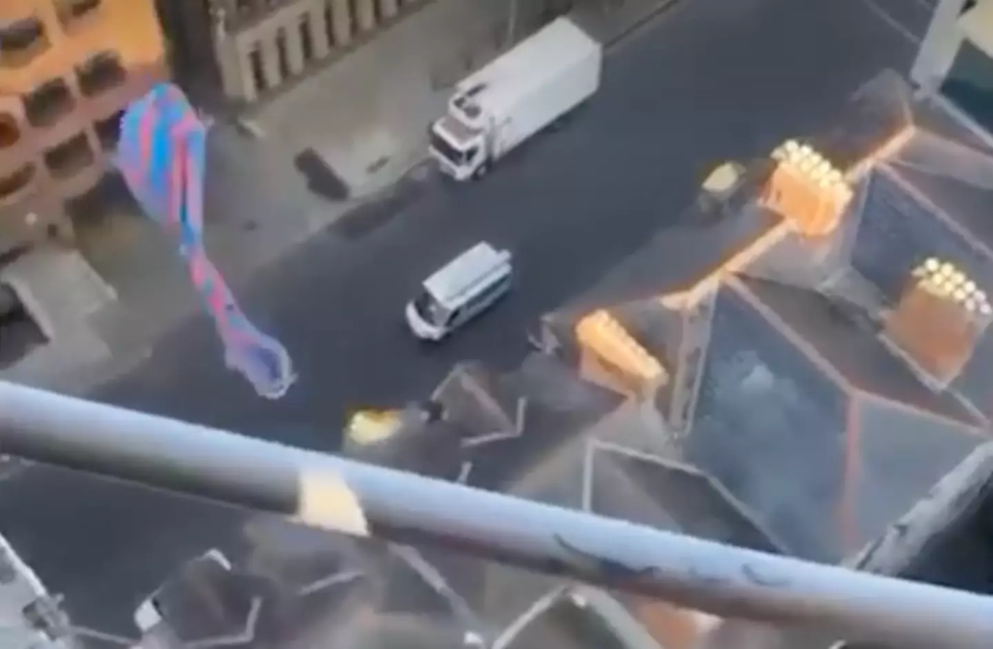 A bag of a man's poo soars through the air after he flung it off a crane in Dublin.