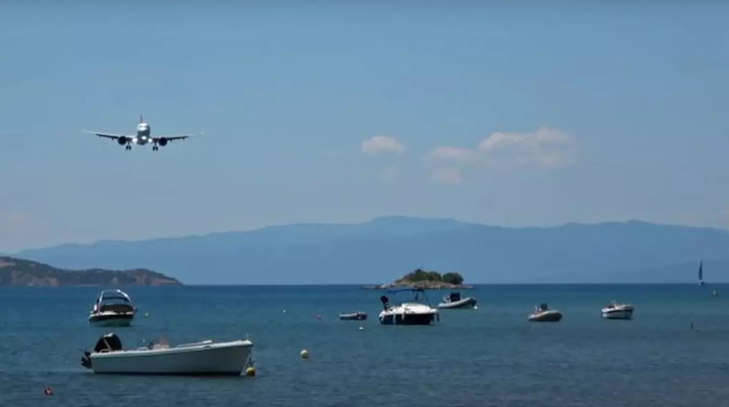 A WizzAir plane is seen approaching the runway.