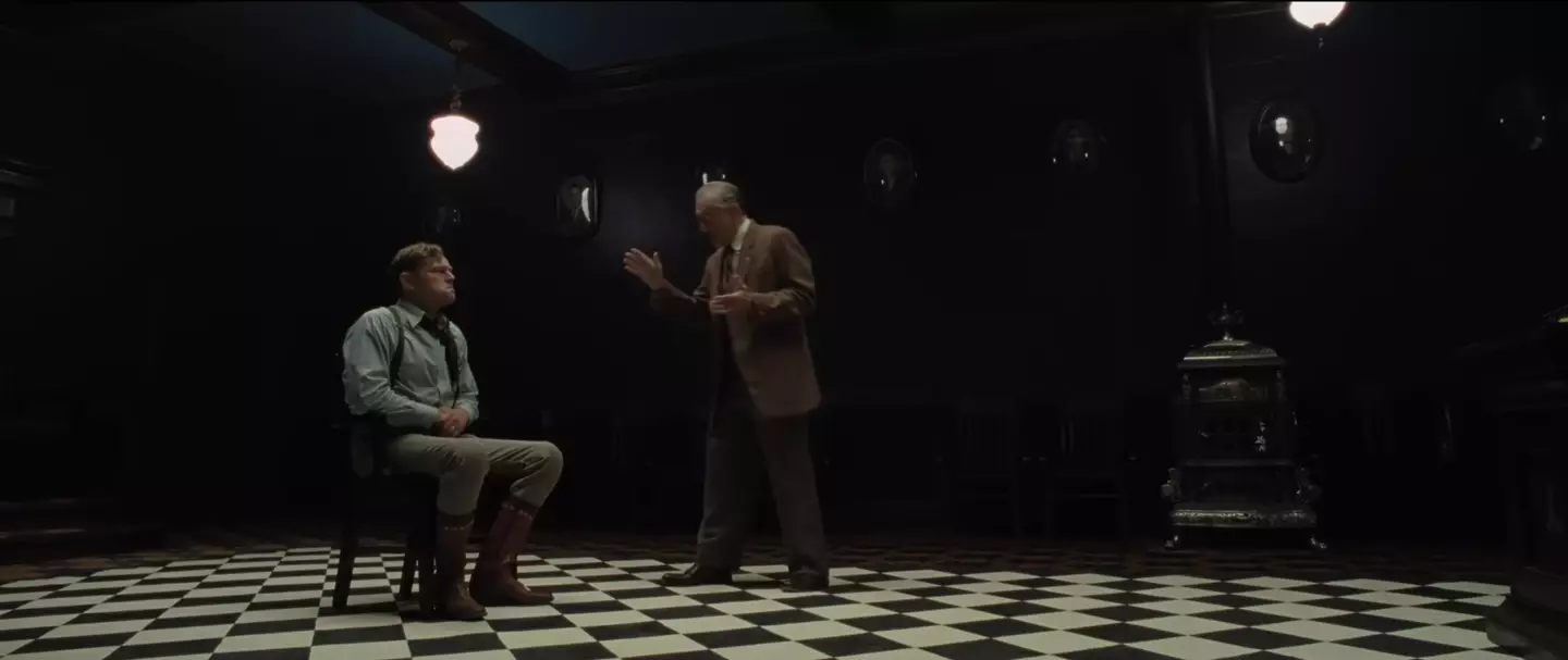 Leonardo DiCaprio wore butt padding during the shocking scene with Robert De Niro.