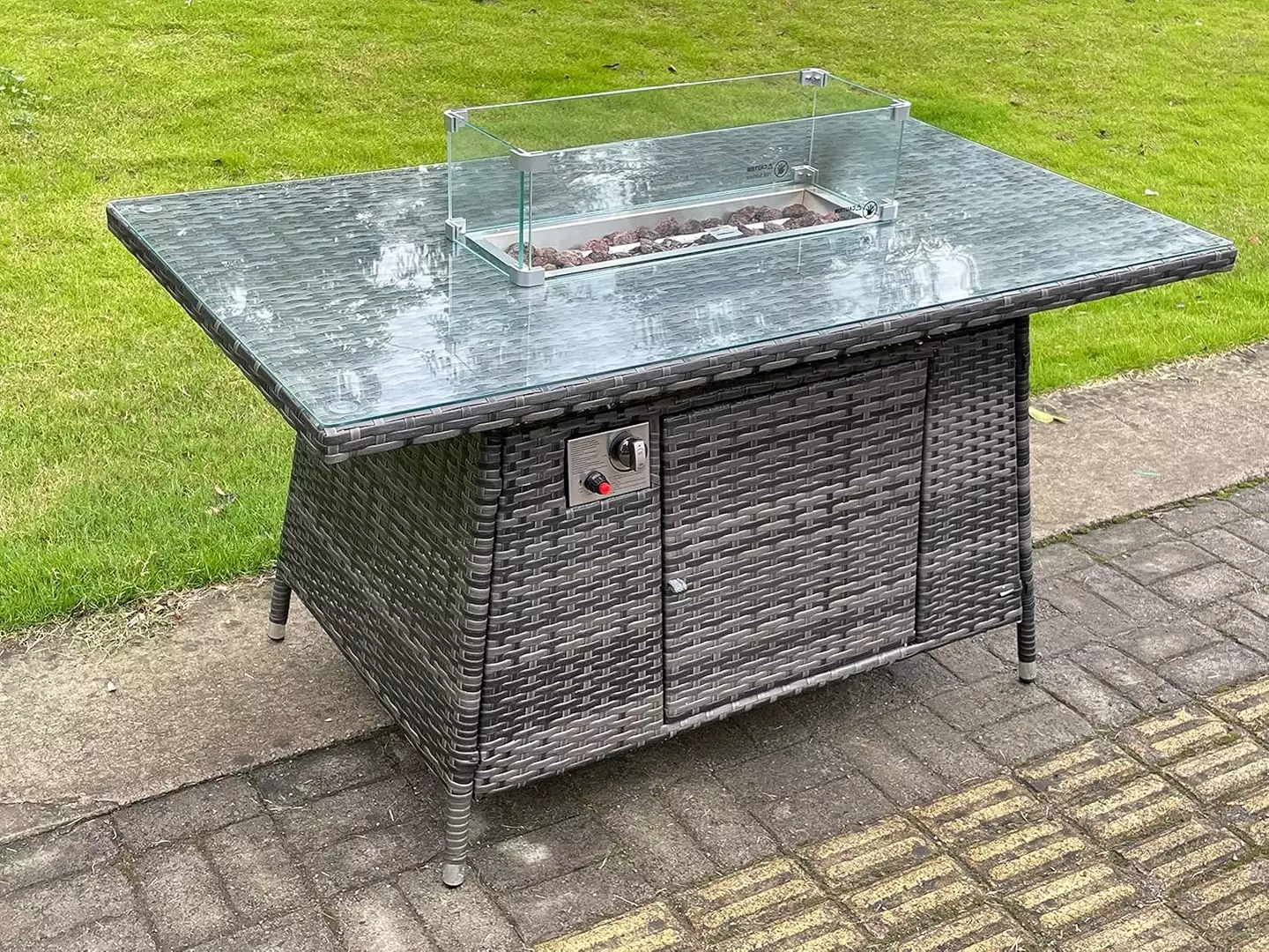 The table comes complete with a fire pit (
