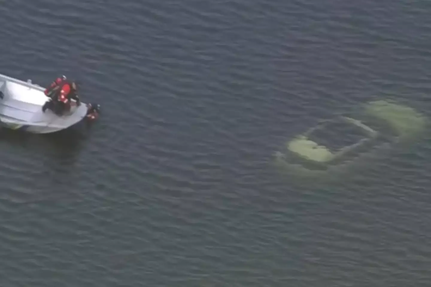 Couple 'getting steamy' in car accidentally roll into river after making vital error 1 The white Range Rover was submerged in the Schuylkill River (CBS)