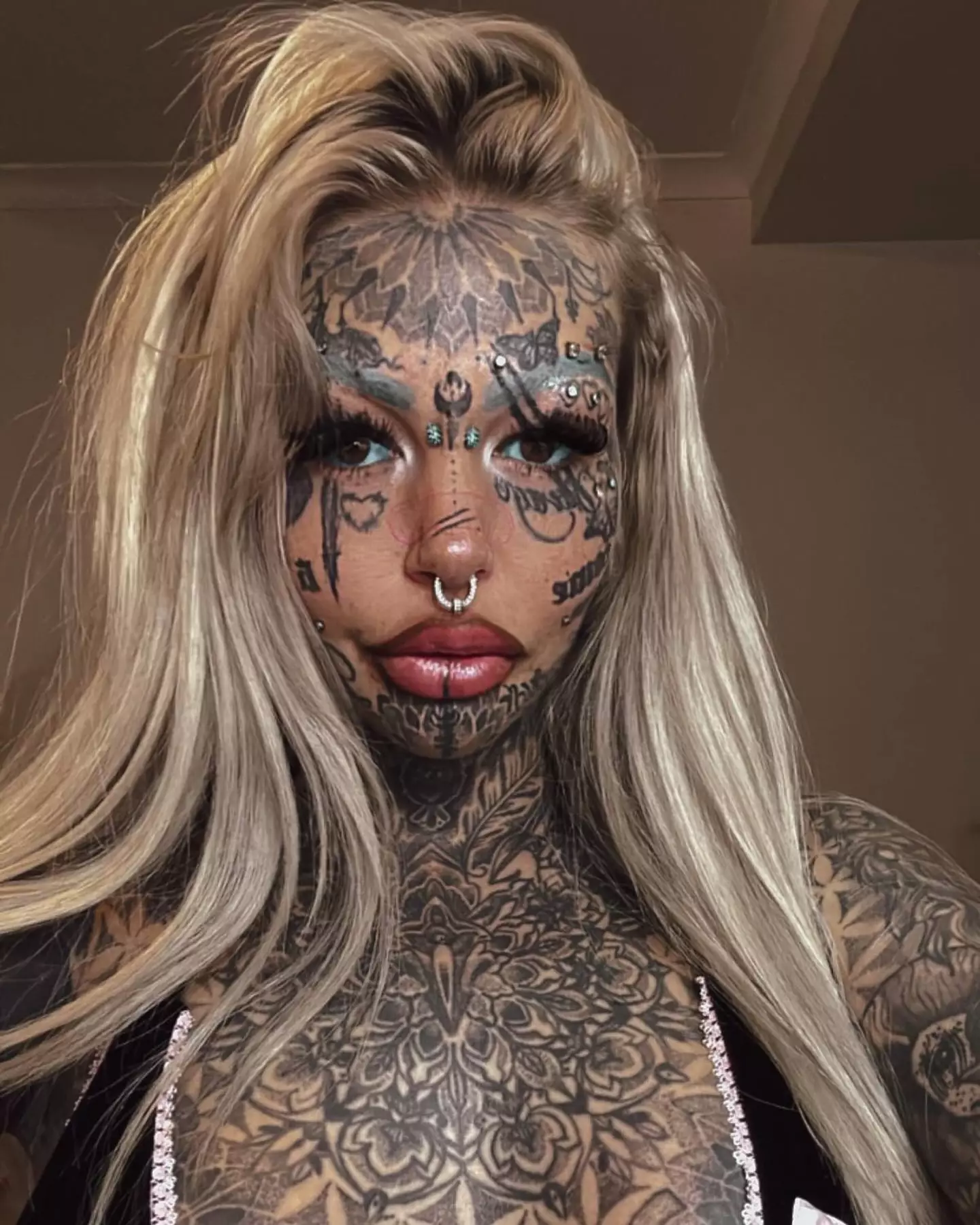 Amber has had her eyeballs tattooed for a second time. (Jam Press)
