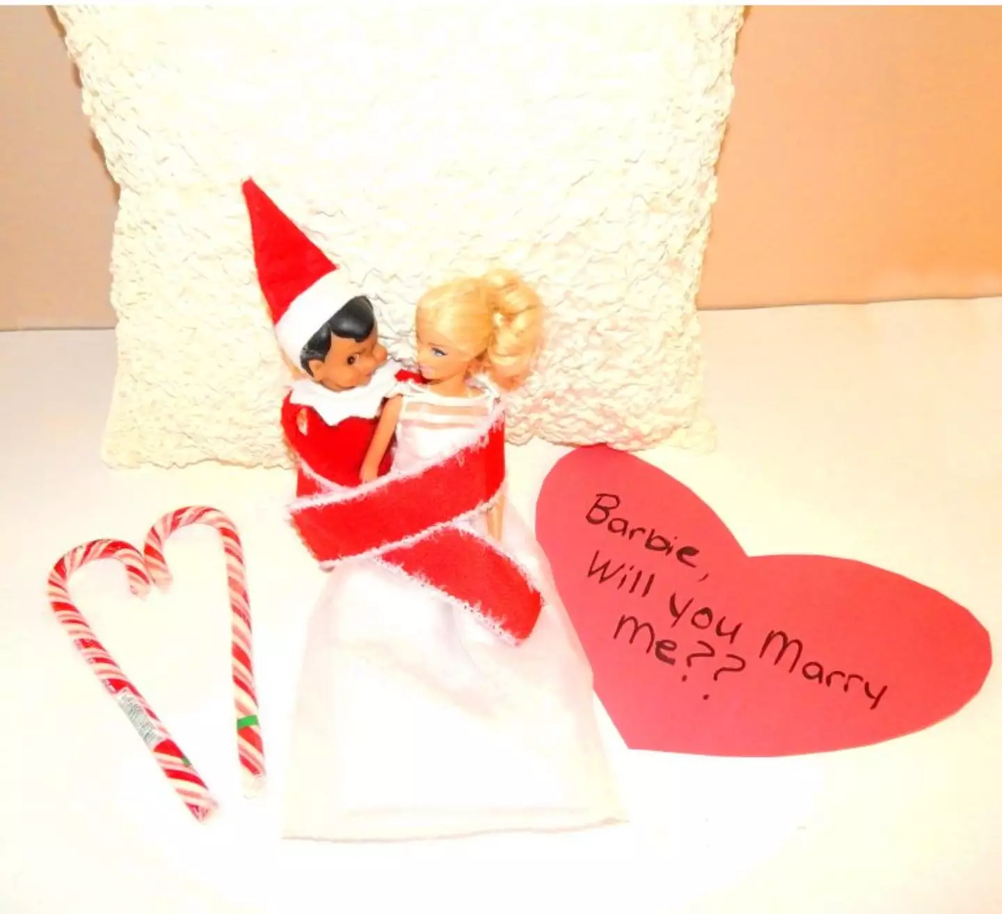 Elf and Barbie get engaged. (