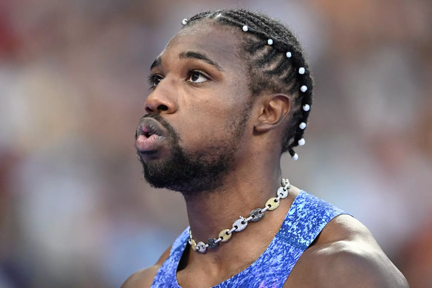 Lyles didn't know what was coming to him. (KIRILL KUDRYAVTSEV/AFP via Getty Images)
