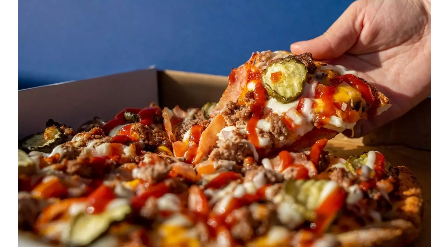 Domino's Australia is launching a new pizza burger to rival McDonald's and Hungry Jacks