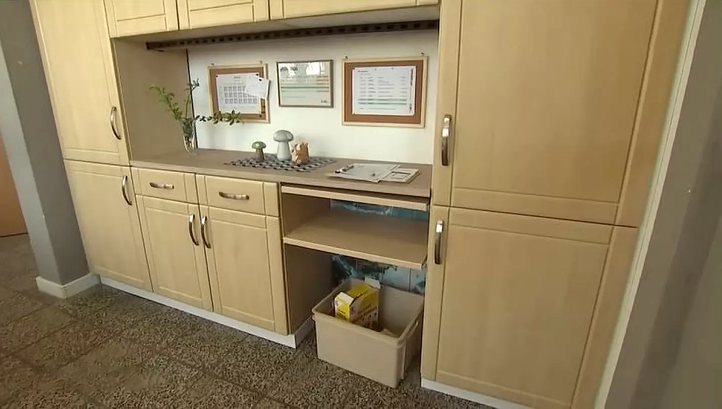 The cash was stashed away inside the cabinet.