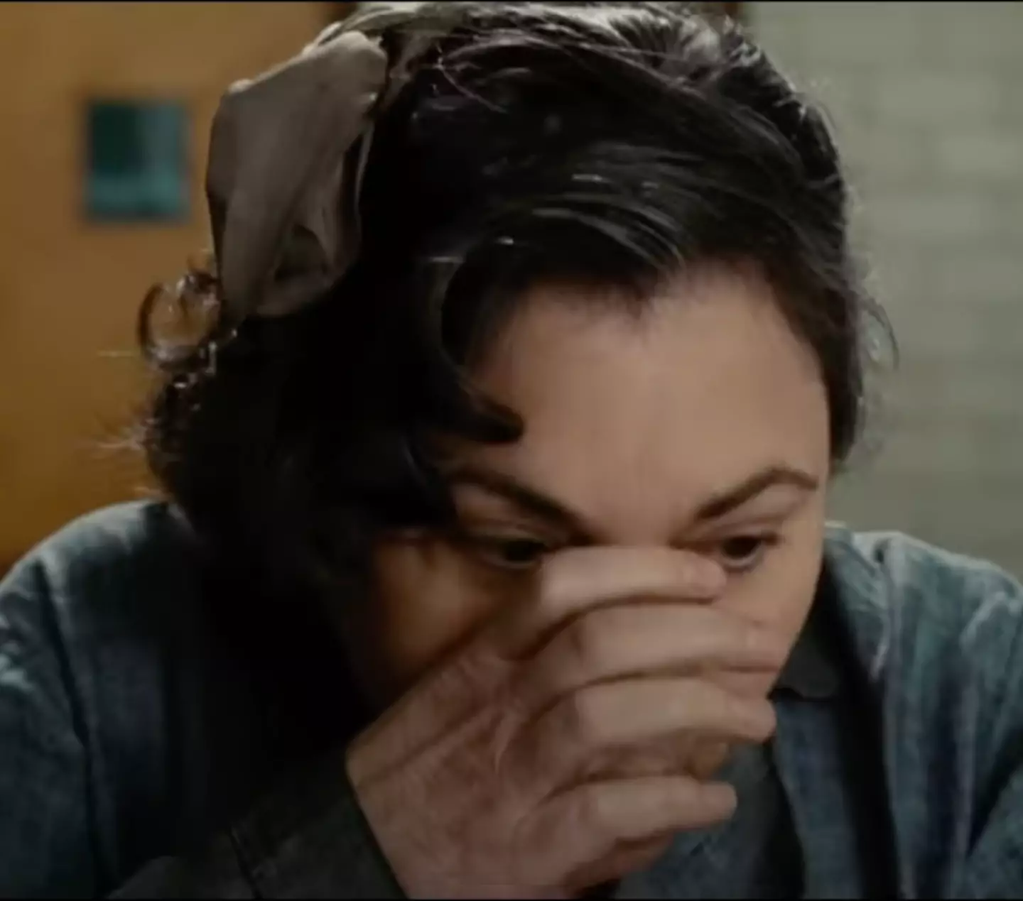 Her glass of water is missing.