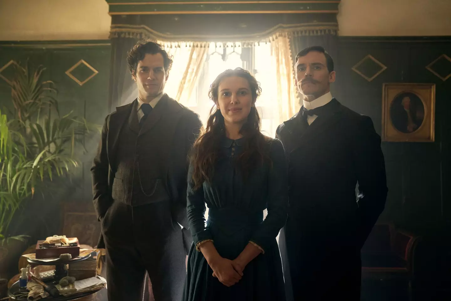 Millie Bobby Brown as Enola Holmes alongside brothers Sherlock (Henry Cavill) and Mycroft (Sam Claflin).