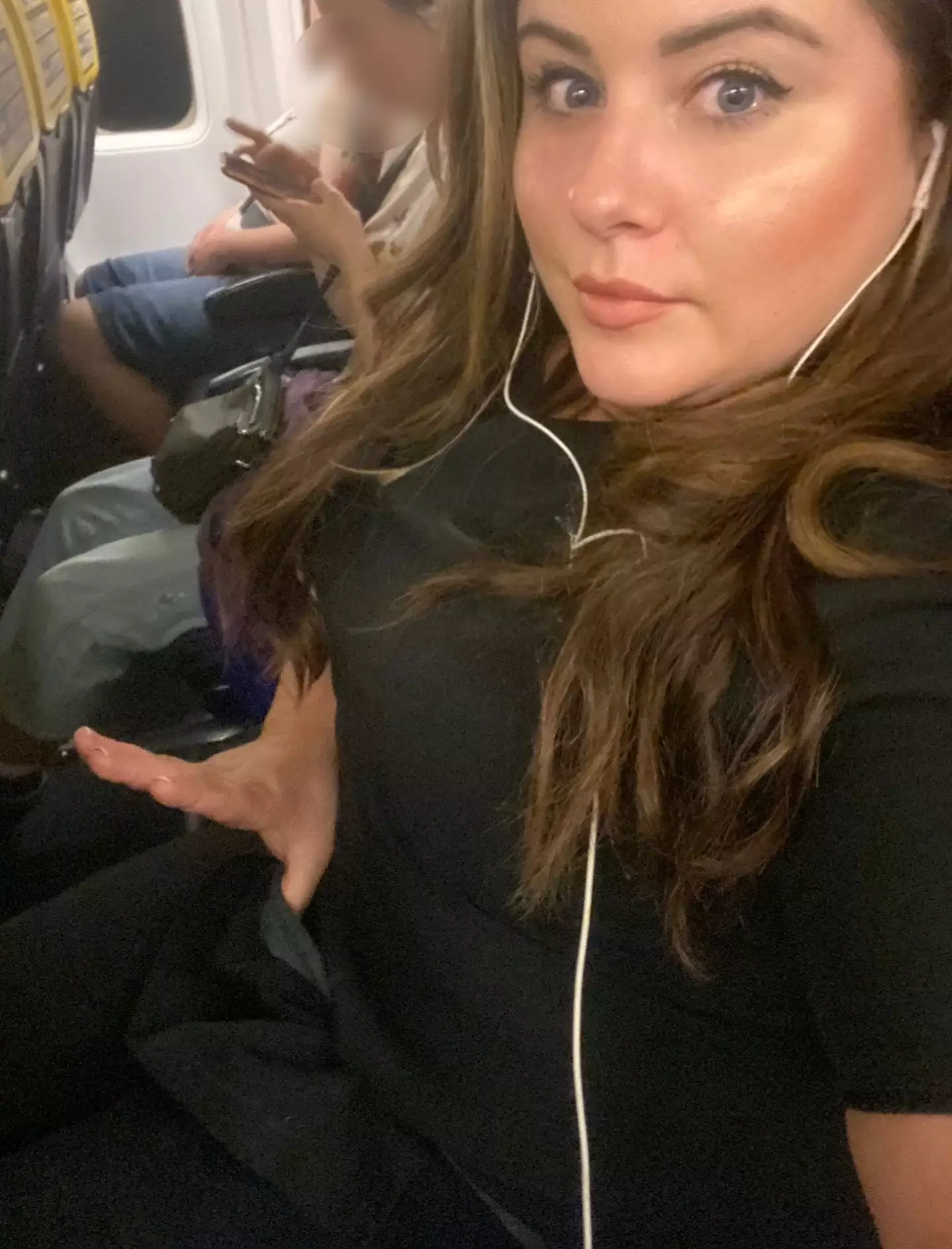 Katie felt like the seatbelt was too tight for comfort.