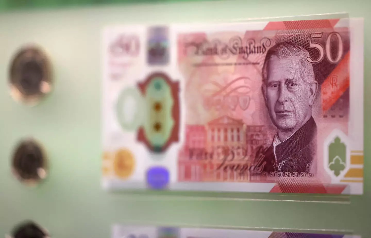 The King Charles III notes entered circulation in June. (DANIEL LEAL/AFP via Getty Images)