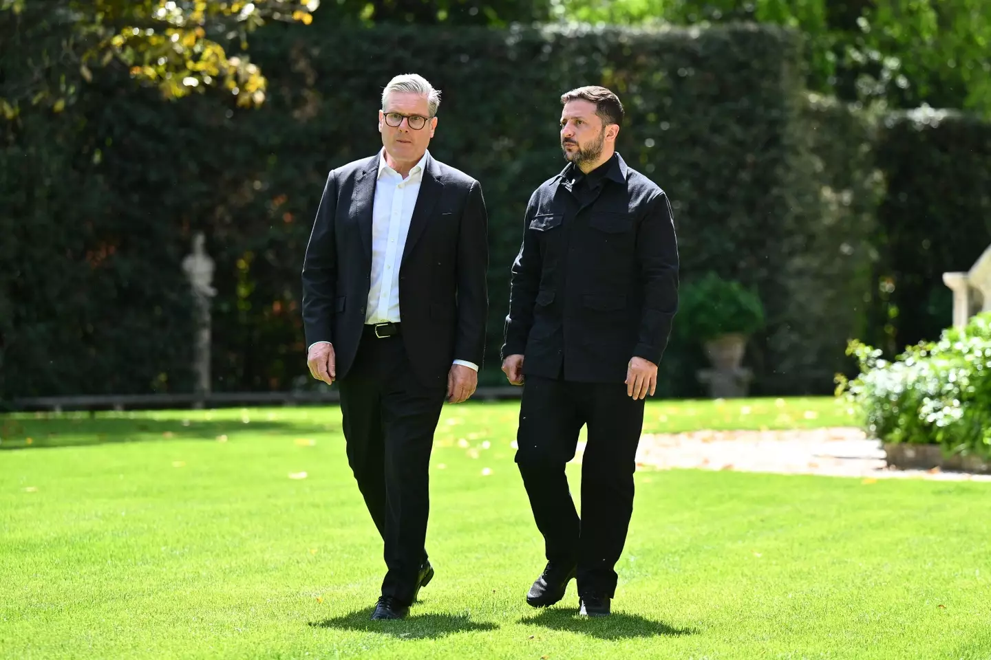 Ukraine's leader, seen with Sir Keir Starmer following the service, wore more casual clobber than most attendees (Marco M. Mantovani/Getty Images)