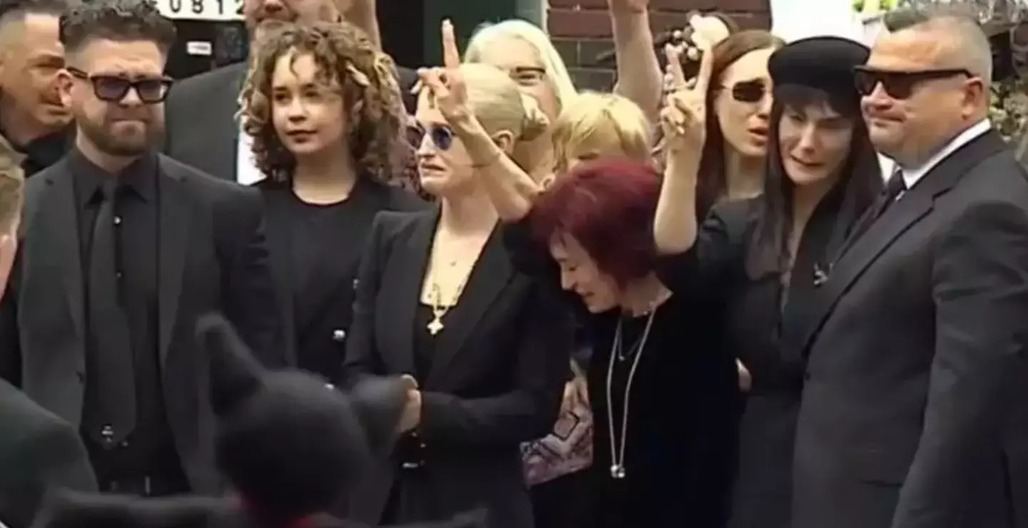 His widow Sharon was seen replicating her late husband's iconic gesture (BBC)